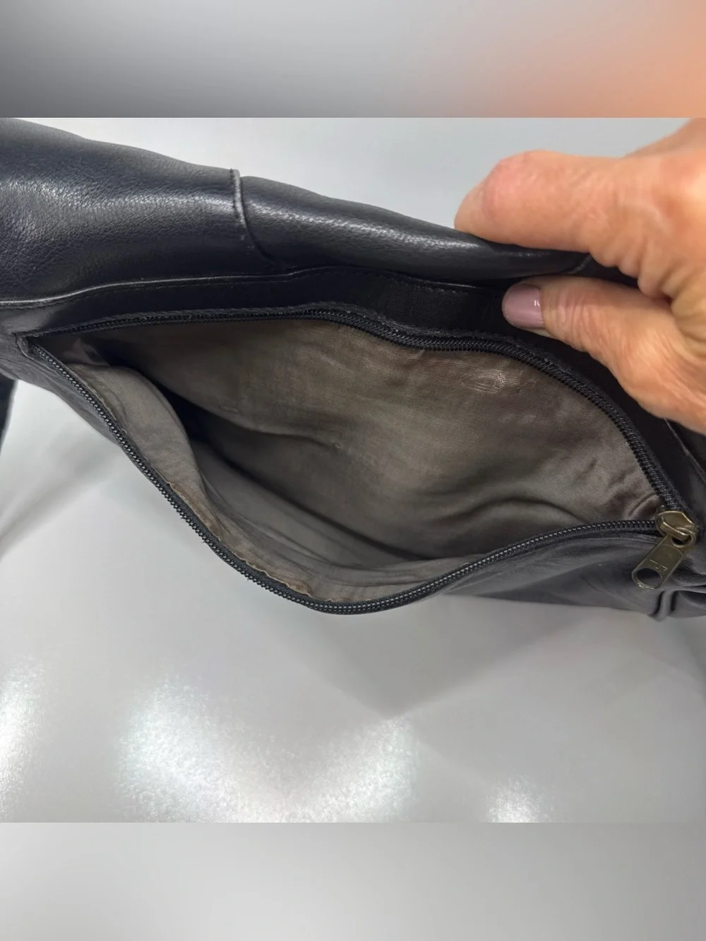 Classic Black Leather Crossbody Saddle Bag by The Bridge